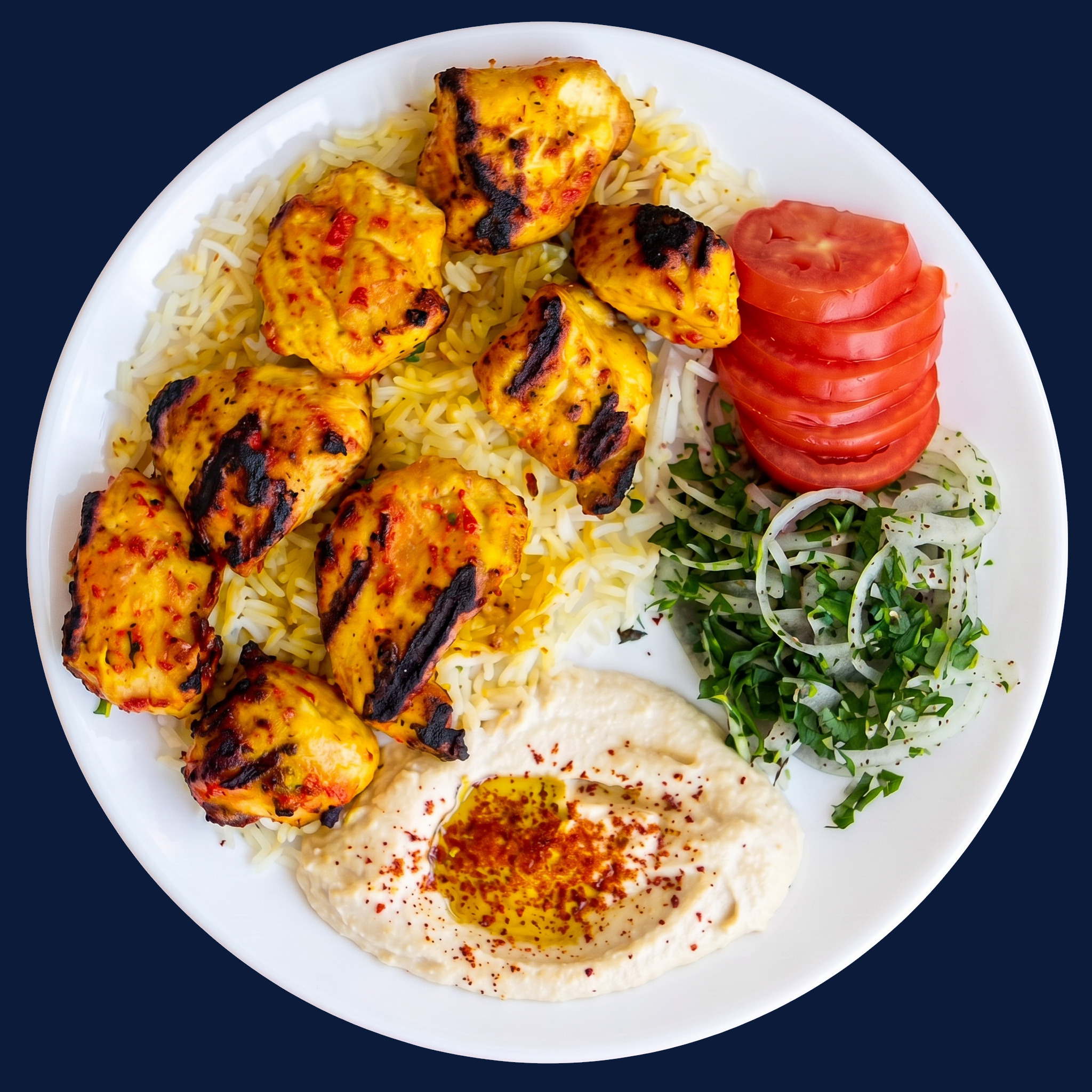 Chicken kebab plate with rice and hummus