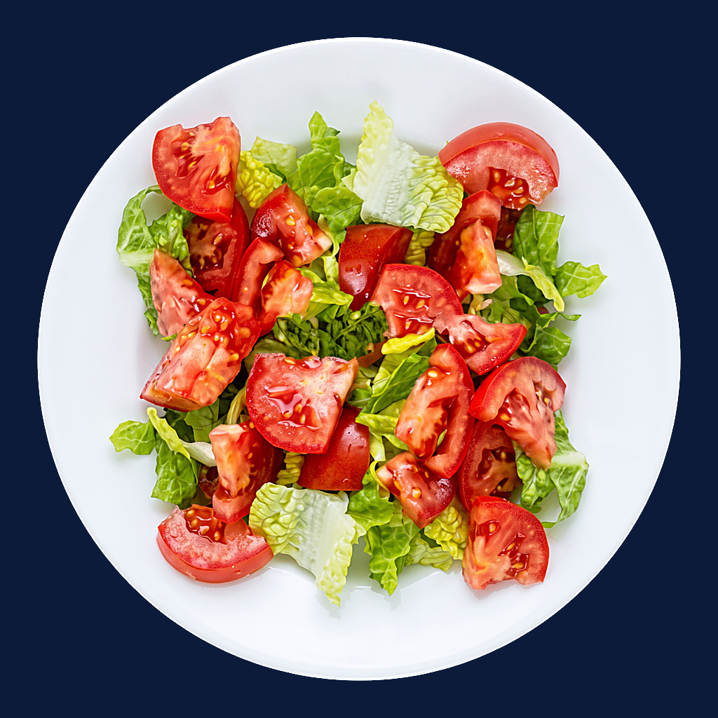 Fresh green salad with tomatoes and lettuce