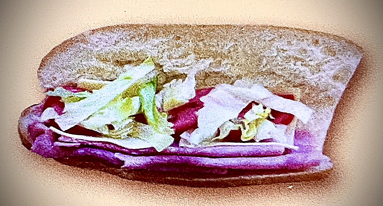 Ham and cheese sandwich with lettuce on french roll